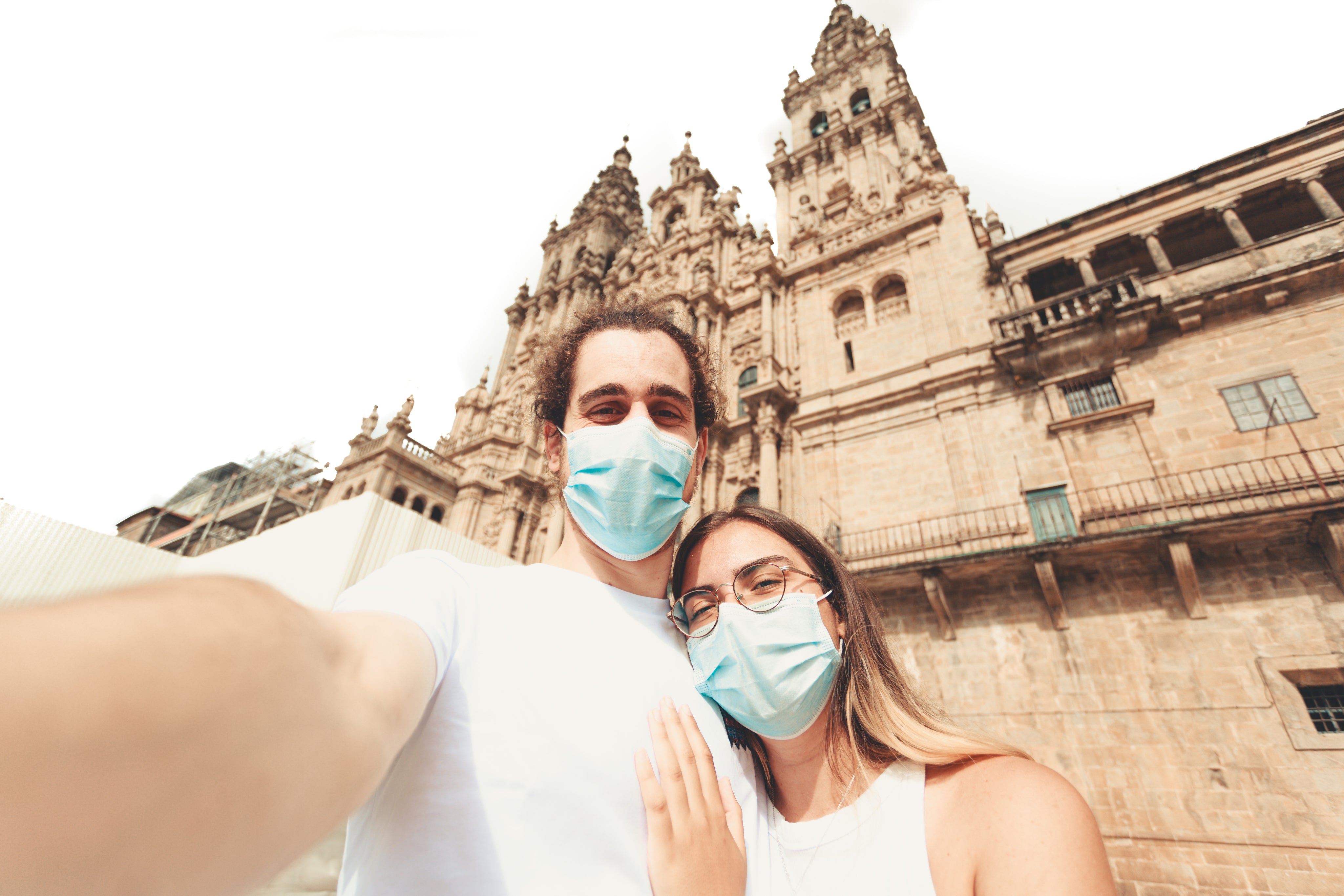 files/man-and-woman-wear-facemasks-looking-at-the-camera.jpg